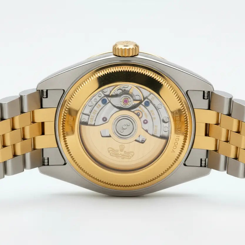 back of automatic watch of rolex with silver and golden chain straps